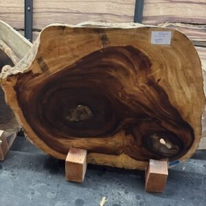 Live edge monkeypod table with round slab surface