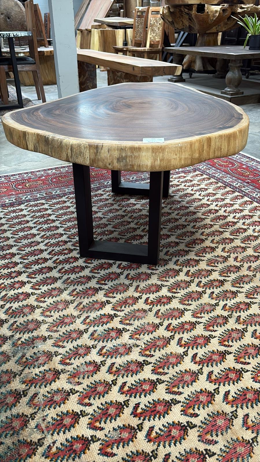 Live edge monkeypod coffee table with round slab surface